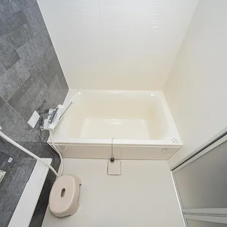 Ferienwohnung メルシアター鈍色の風・最上階デザイナーズルーム Ōsaka Exterior foto