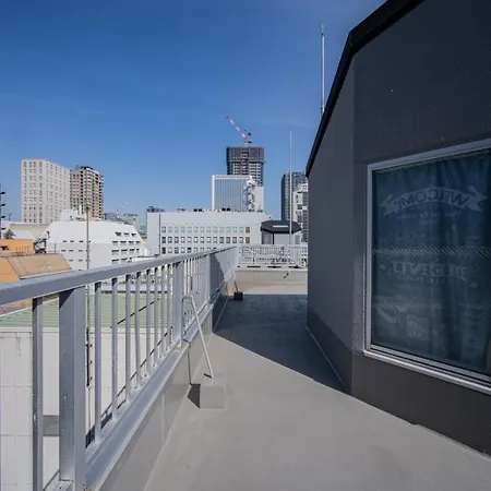 Ferienwohnung メルシアター鈍色の風・最上階デザイナーズルーム Ōsaka Exterior foto